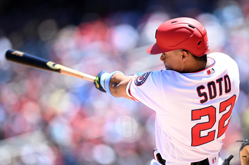 Juan Soto #22 of the Washington Nationals hits a three-run home run in the second inning of an MLB game against the Philadelphia Phillies at Nationals Park on June 19, 2022 in Washington, DC.