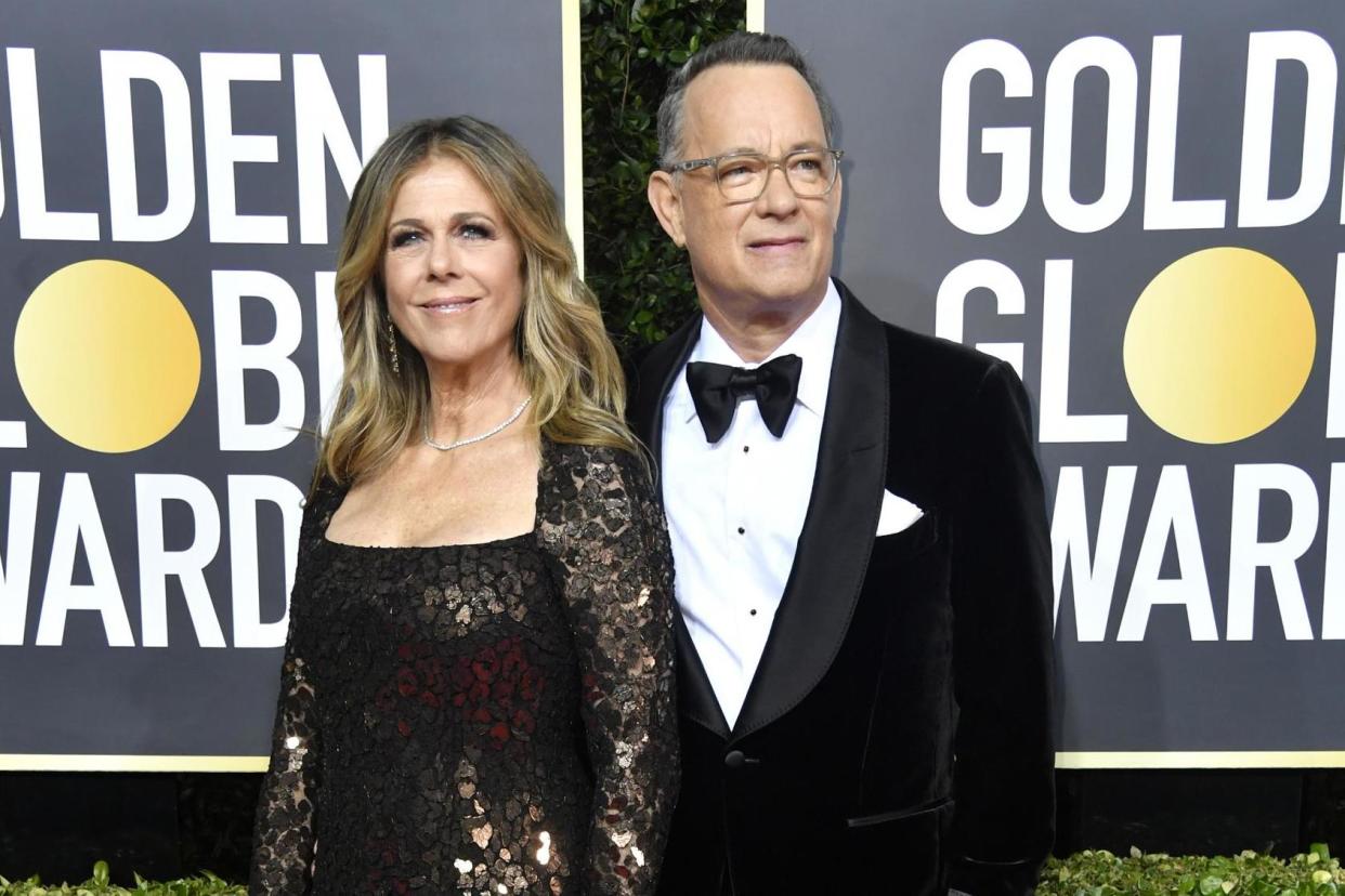 Rita Wilson and husband Tom Hanks looking slick on the red carpet: Photo by Frazer Harrison/Getty Images