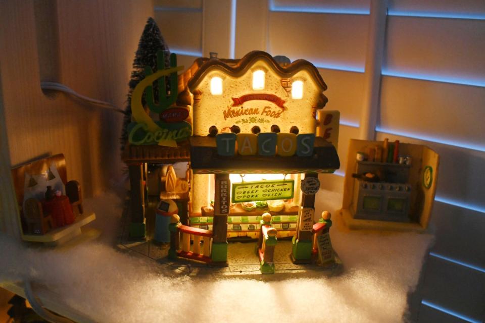 Brenda Ray-Perow and her late husband Terry Perow both loved Mexican food so there is a Mexican restaurant in their Christmas Village. The pieces they chose were reflective of their lives.