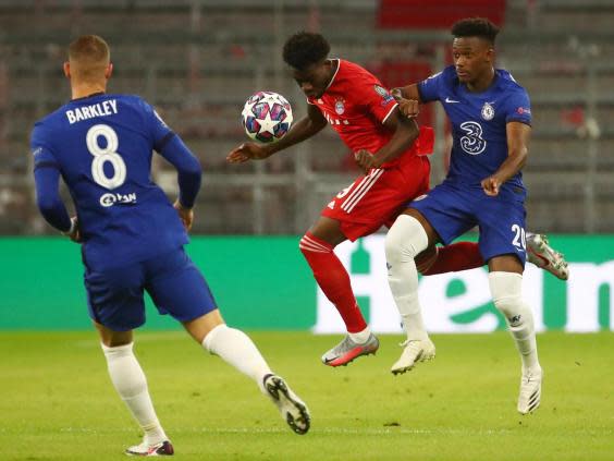 Bayern Munich’s Alphonso Davies in action with Chelsea’s Callum Hudson-Odoi (REUTERS)