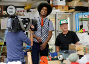 Japanese television personality Jun Soejima is filmed for public broadcast breakfast show with a greengrocer at the latter's shop in Tokyo, Japan, September 12, 2018. Picture taken September 12, 2018. REUTERS/Toru Hanai