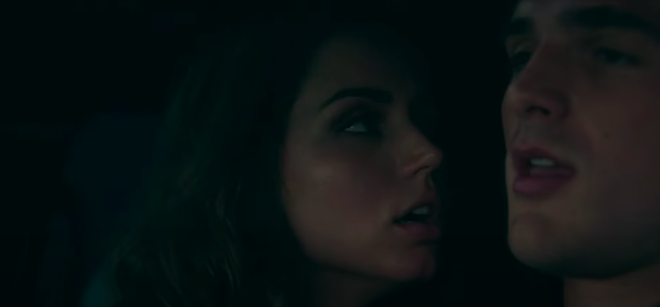 Ana de Armas close to Jacob's face in a scene from Deep Water