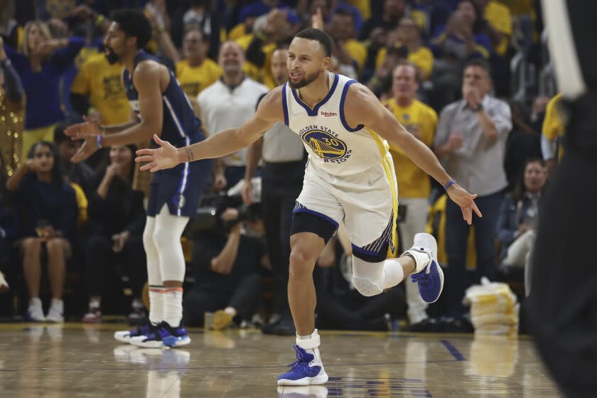 Golden State Warriors guard Stephen Curry reacts during the first half of Game 2.