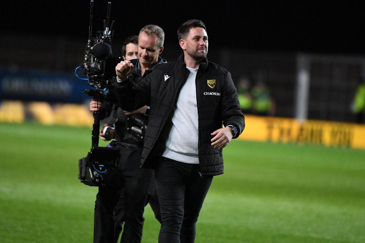 Oxford United head coach Des Buckingham celebrates at full-time <i>(Image: Mike Allen)</i>