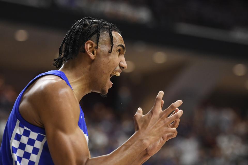 Kentucky forward Jacob Toppin reacts to a team foul called against Kentucky during the second half of an NCAA college basketball game against Texas A&M on Wednesday, Jan. 19, 2022, in College Station, Texas. (AP Photo/Justin Rex)