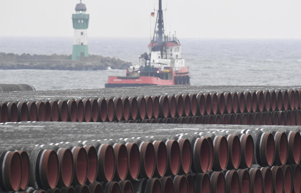 Pipes for the Nord Stream 2 Baltic Sea gas pipeline are stored on the premises of the port of Mukran near Sassnitz, Germany, on Dec. 4, 2020. Russia's natural gas pipeline to Europe is built and ready to flow. But not so fast. The Nord Stream 2 pipeline faces a rocky road ahead. First there's statement by the U.S. secretary of state that gas won't flow if Russia launches military aggression against Ukraine. (Stefan Sauer/dpa via AP, File)