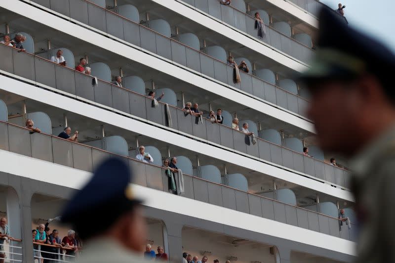 Passengers of MS Westerdam, cruise ship that spent two weeks at sea after being turned away by five countries over fears that someone aboard might have the coronavirus are seen in Sihanoukville, Cambodia