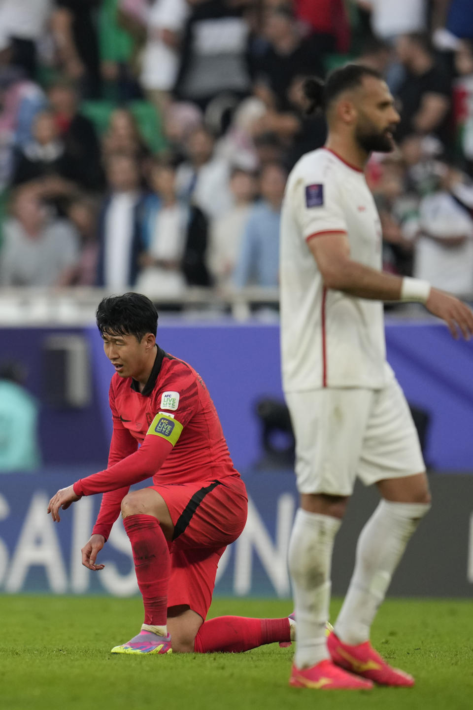 South Korea's Son Heung-min reacts after the Asian Cup Group E soccer match between Jordan and South Korea at Al Thumama in Doha, Qatar, Saturday, Jan. 20, 2024. The match ended 2-2. (AP Photo/Aijaz Rahi)