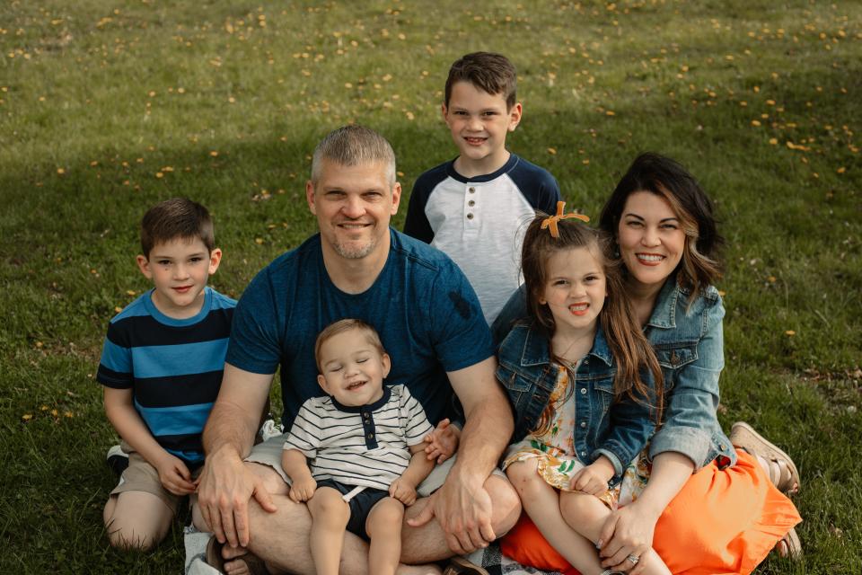 The Detwiler family takes a portrait in 2021. From left: Daniel, Brad (David in lap), Domenik, Stella and Carlla.