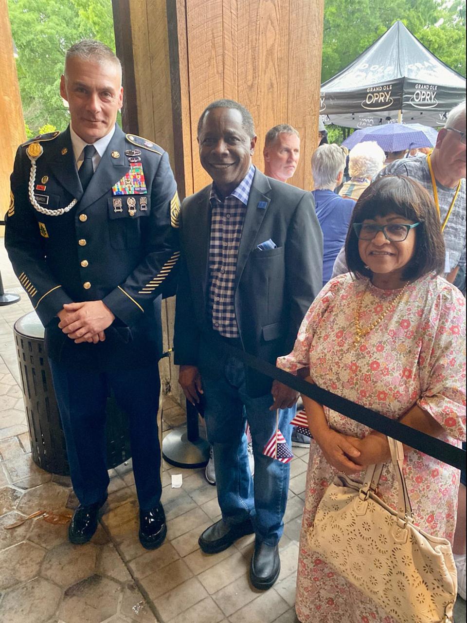 U.S. Army Command Sgt. Maj. Andrew Lombardo, left, visits with MTSU President Sidney A. McPhee and first lady Elizabeth McPhee May 24 outside the Grand Ole Opry House in Nashville, Tenn. They attended the Opry's annual Salute to Troops show. Lombardo spent part of his day touring the Daniels Veterans Center, meeting criminal justice and military science staff and learning what the university has to offer for veteran students.