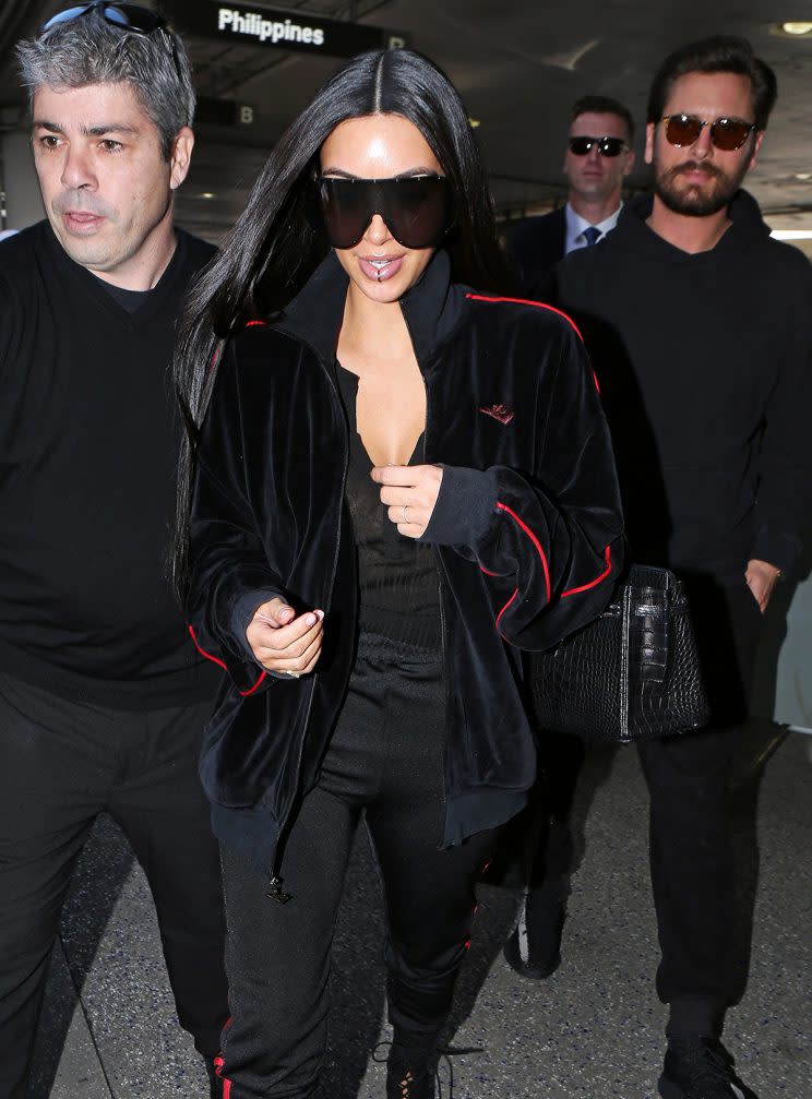 Kim Kardashian behind oversize sunglasses