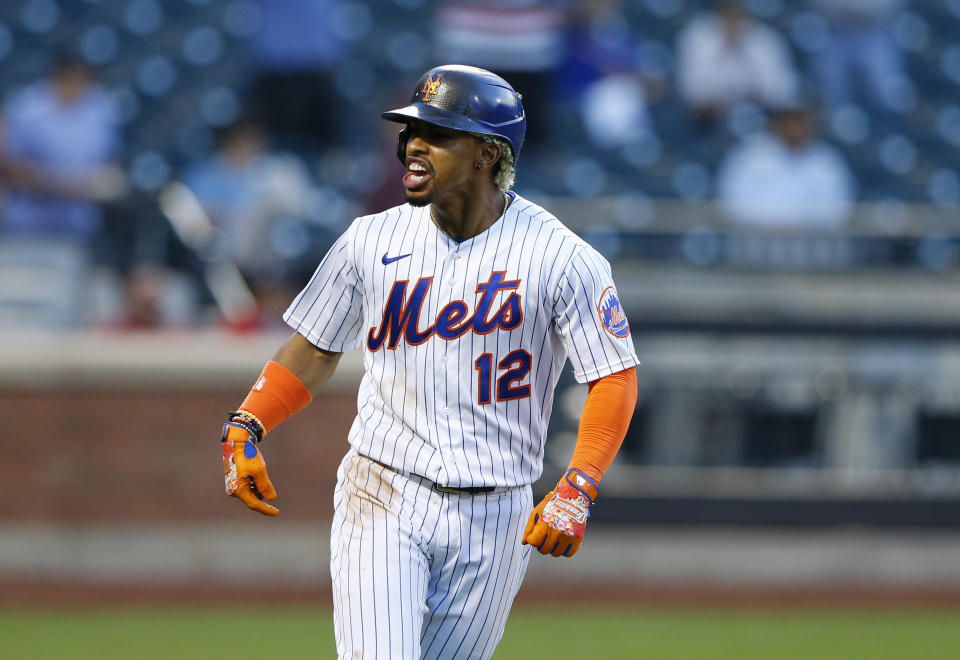 New York Mets shortstop Francisco Lindor reacts after hitting a home run against the Atlanta Braves during the second inning of a baseball game Wednesday, June 23, 2021, in New York. (AP Photo/Noah K. Murray)