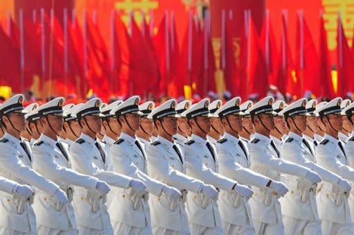 Chinese People's Liberation Army (PLA) naval officers marching past Tiananmen Square in 2009. China's cyber warfare capabilities have reached a point where they would pose a danger to the US military in the event of a conflict, according to a report prepared for the US Congress released on Thursday