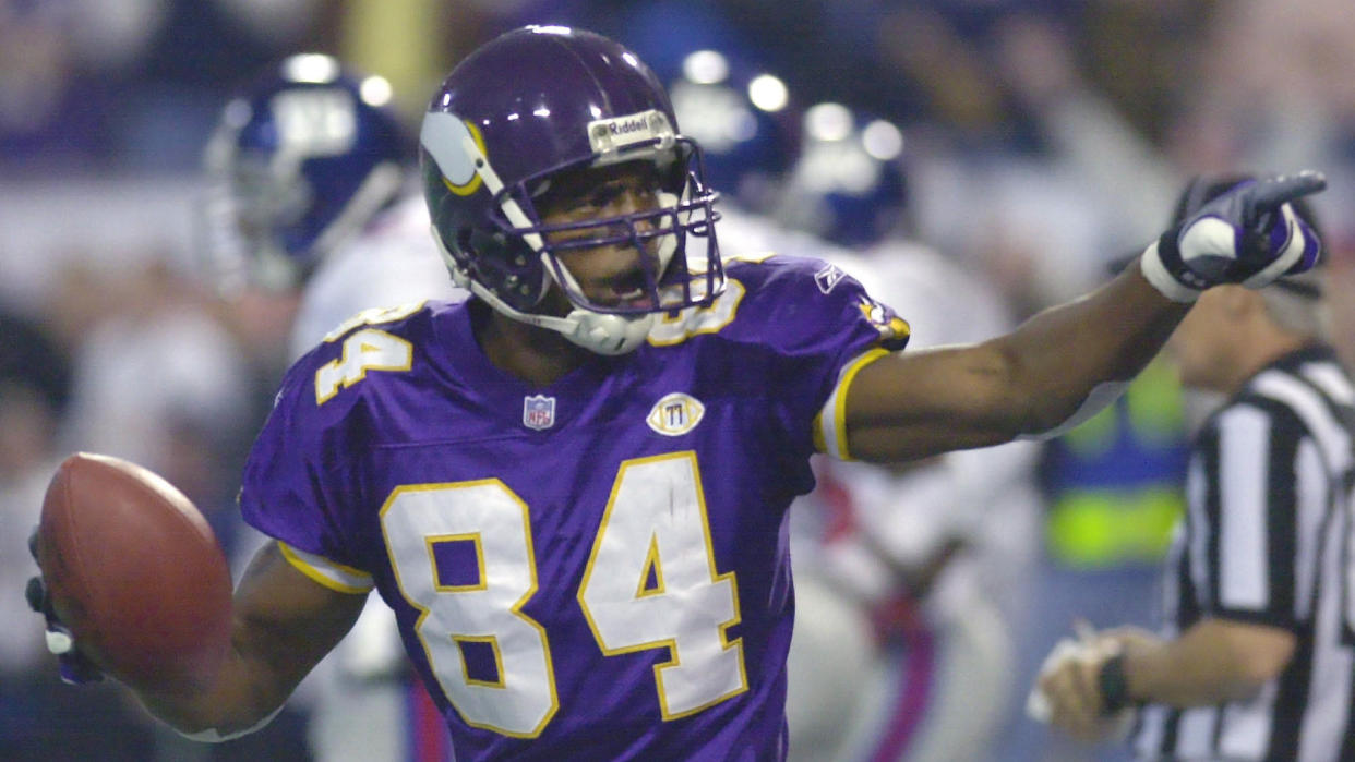 Mandatory Credit: Photo by Ann Heisenfelt/AP/Shutterstock (6463705a)MOSS Minnesota Vikings wide receiver Randy Moss points to fans as he celebrates a touchdown against the New York Giants in Minneapolis on Nov.