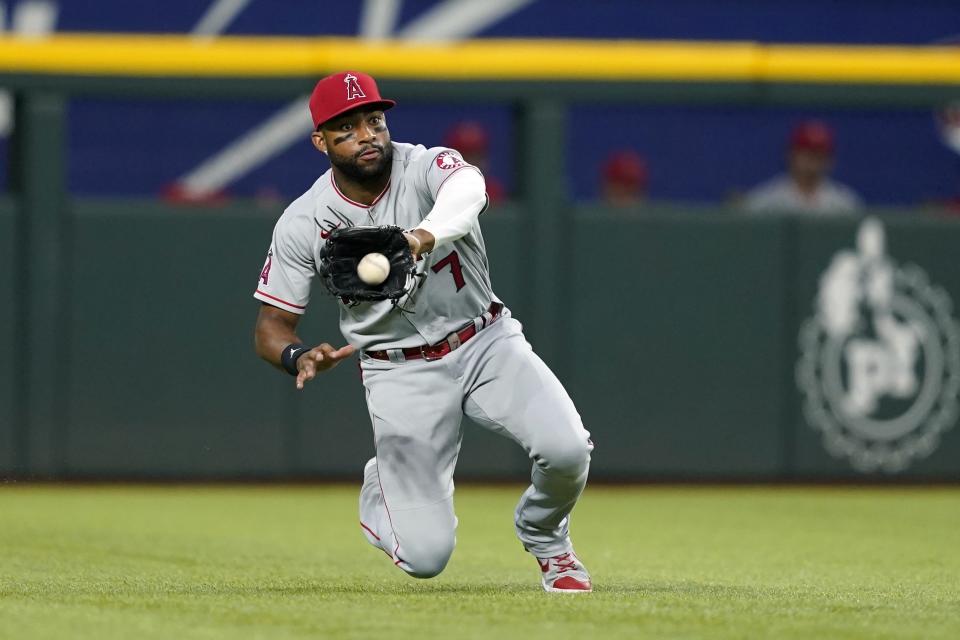 Los Angeles Angels left fielder Jo Adell makes a sliding catch on a fly out by Texas Rangers' Josh Jung in the second inning of a baseball game in Arlington, Texas, Thursday, Sept. 22, 2022. (AP Photo/Tony Gutierrez)