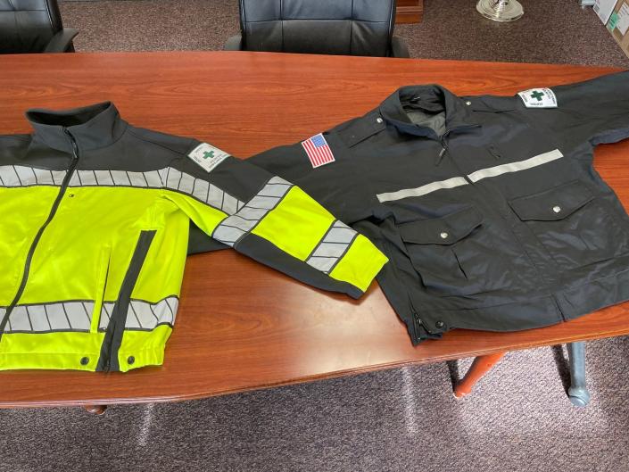 A comparison of the current jackets worn by the Central Oneida County Volunteer Ambulance Corps (left) to the one worn by the Saudi migrant detained last Thursday.