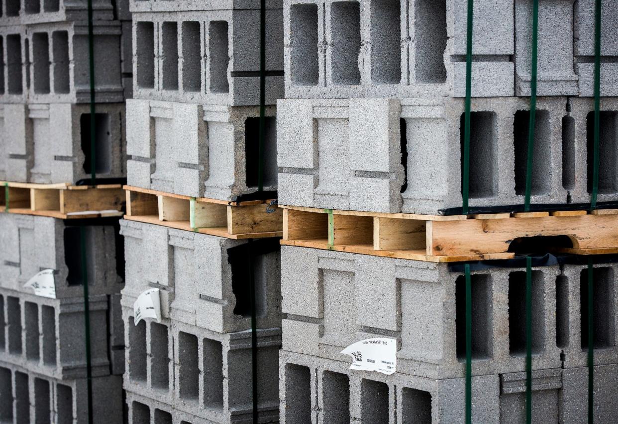 Construction materials are stacked at the future site of CANPACK at Cowan and Fuson roads Thursday, Jan. 27, 2022.