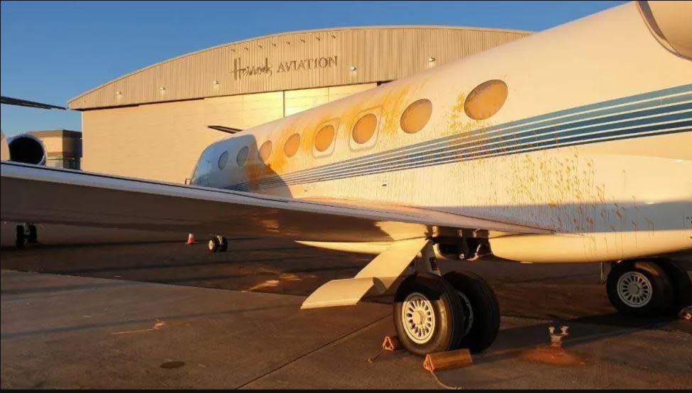 Jets sprayed with orange spray paint