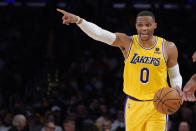 Los Angeles Lakers guard Russell Westbrook directs the offense during the first half of an NBA basketball game against the Houston Rockets Tuesday, Nov. 2, 2021, in Los Angeles. (AP Photo/Marcio Jose Sanchez)