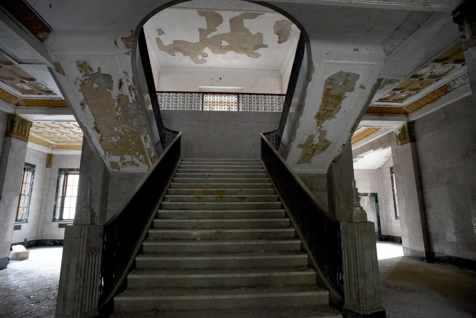 The iconic marble staircase in the lobby of the former St. Mary Academy building is shown.  Plans are to maintain and repair the staircase.