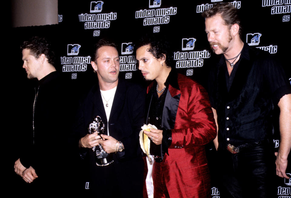 American heavy metal band Metallica celebrate after winning the 'Best Hard Rock Video' award