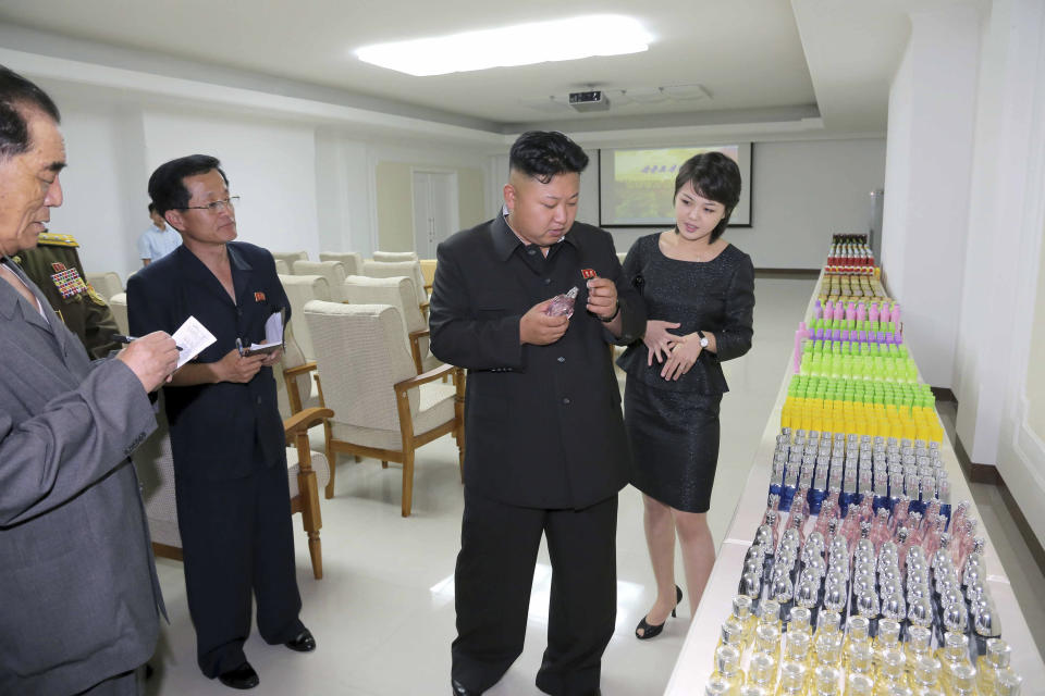 North Korean leader Kim Jong Un visits Taedonggang Combined Fruit Farm and Taedonggang Combined Fruit Processing Factory together with Ri Sol Ju in June of 2014.&nbsp;