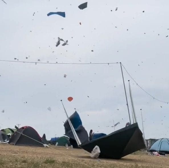 Huge amount of detritus is lifted high into the air by powerful wind