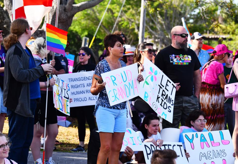 About 250 people gathered at Eau Gallie Square Friday evening to celebrate International Transgender Day of Visibility. The Friday event was organized by Spektrum, a nonprofit LGBTQ healthcare provider with clinics in Orlando and Melbourne.
