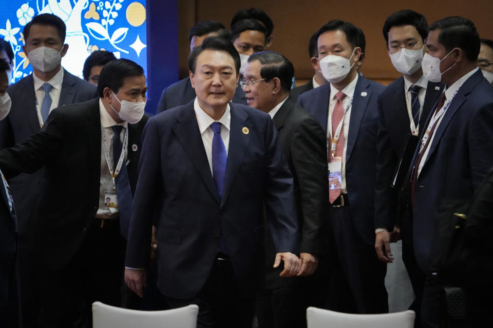 South Korea's President Yoon Suk-yeol arrives for the ASEAN - South Korea Summits (Association of Southeast Asian Nations) in Phnom Penh, Cambodia, Friday, Nov. 11, 2022. The ASEAN summit kicks off a series of three top-level meetings in Asia, with the Group of 20 summit in Bali to follow and then the Asia Pacific Economic Cooperation forum in Bangkok. (AP Photo/Anupam Nath)