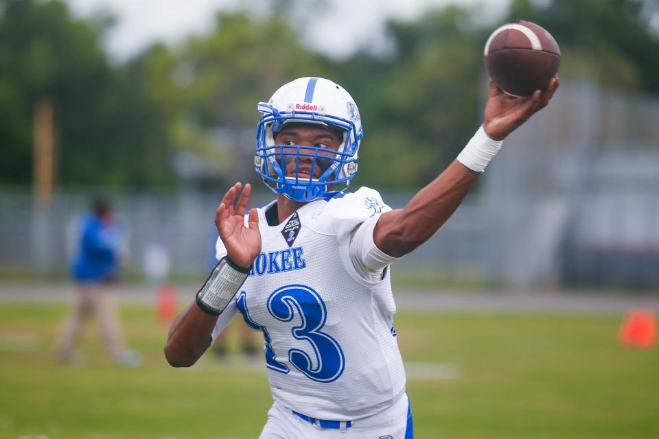 Pahokee quarterback Austin Simmons (13) throws the ball during warmups prior to the start of the football game between Pahokee and host Palm Beach Central on Friday, September 16, 2022, in Wellington, FL. Final score, Pahokee, 34, Palm Beach Central, 14.