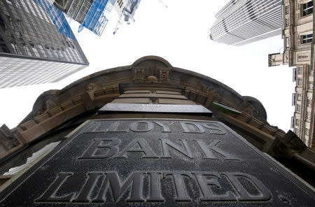 FILE PHOTO: Signage at the entrance to a branch of Lloyds Bank in the City of London financial district, September 4, 2017. REUTERS/Toby Melville/File Photo