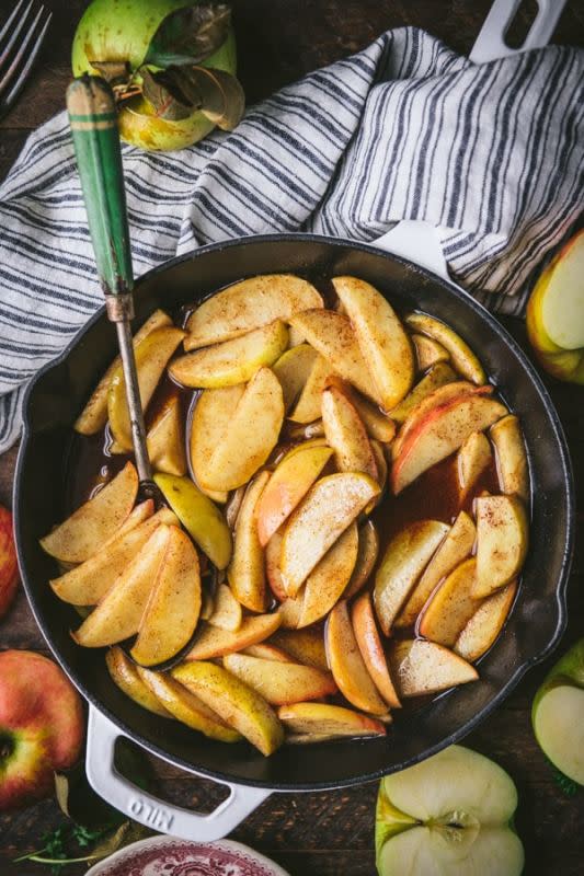 <p>The Seasoned Mom</p><p>Thanks to plenty of butter, brown sugar, cinnamon, cloves, ginger, and nutmeg, the warm dish tastes just like apple pie filling! </p><p><strong>Get the recipe: <em><a href="https://www.theseasonedmom.com/baked-apples/" rel="nofollow noopener" target="_blank" data-ylk="slk:Baked Apple Slices with Brown Sugar and Cinnamon;elm:context_link;itc:0;sec:content-canvas" class="link ">Baked Apple Slices with Brown Sugar and Cinnamon</a></em></strong></p>