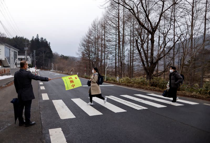 The Wider Image: Last students graduate: School closures spread in ageing Japan