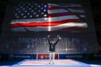 Jun 29, 2016; Omaha, NE, USA; Michael Phelps reacts at the medal ceremony during the U.S. Olympic Swimming Team Trials at CenturyLink Center. Rob Schumacher-USA TODAY Sports