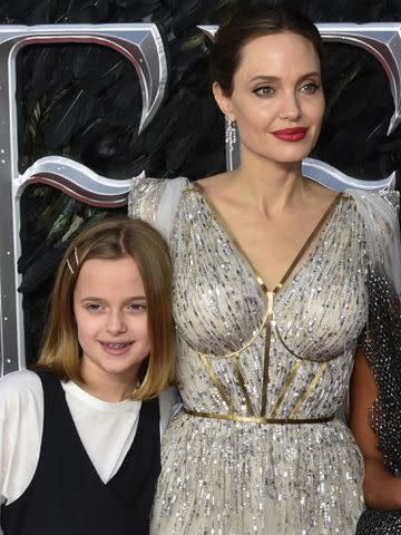 <p>James Warren/SOPA Images/LightRocket/Getty</p> Vivienne Jolie-Pitt and Angelina Jolie attend the 'Maleficent: Mistress of Evil' European Premiere on October 9, 2019.