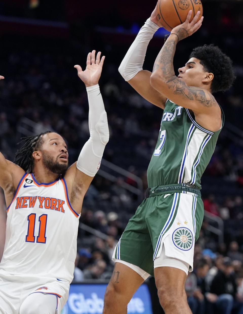 Detroit Pistons guard Killian Hayes (7) shoots over the defense of New York Knicks guard Jalen Brunson (11) during the first half of an NBA basketball game, Tuesday, Nov. 29, 2022, in Detroit.