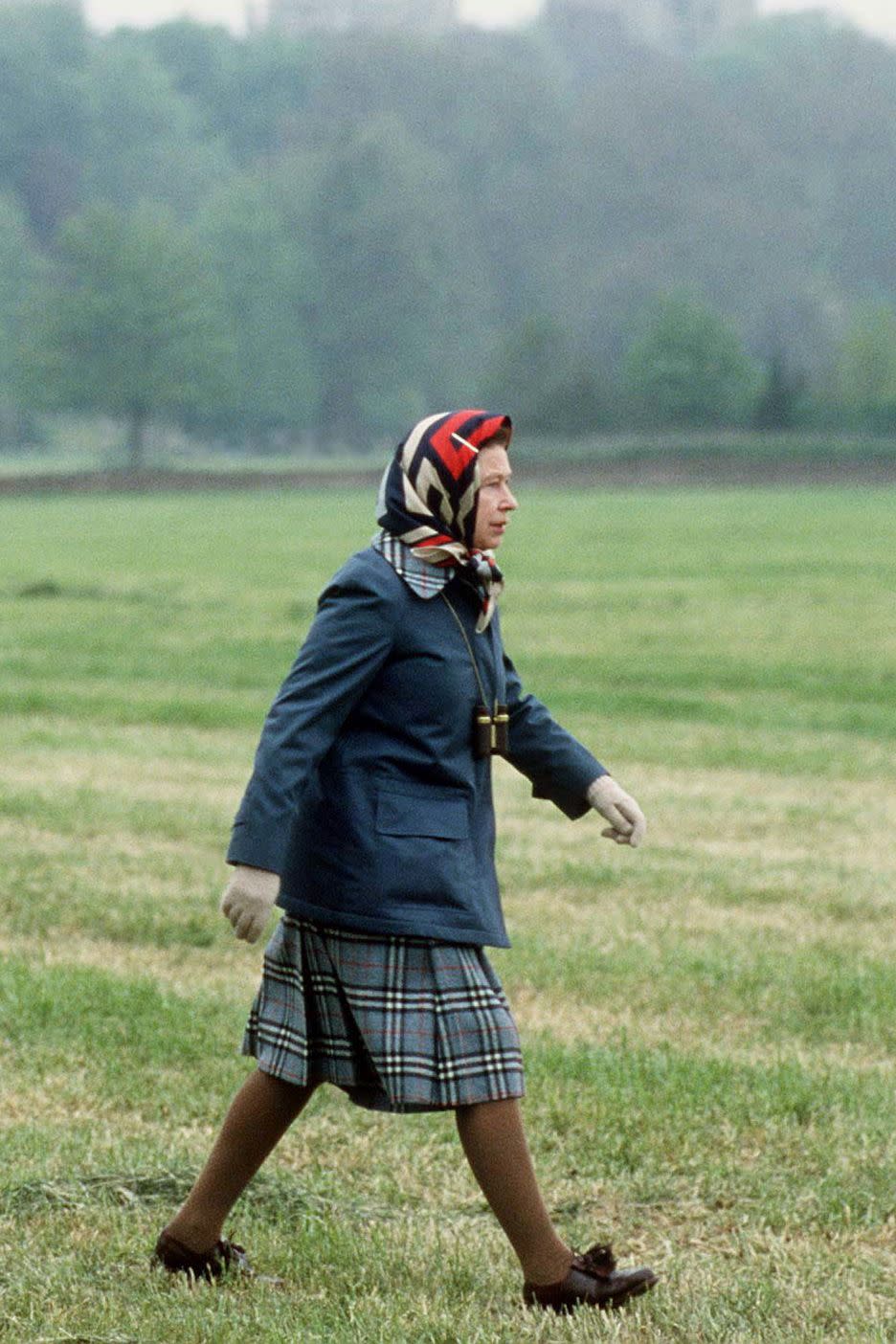 <p>While she's all for coordinating jacket-skirt combos, the Queen isn't afraid to do a little bit of power clashing with her head-scarf choices.</p>