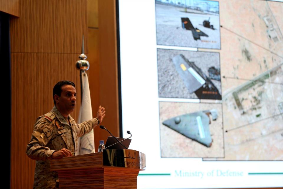 Saudi defence ministry spokesman Colonel Turki Al-Malik talks to journalist at a news conference in Riyadh (REUTERS)