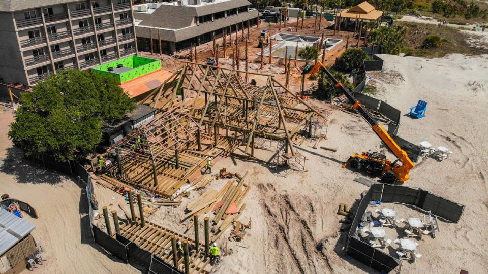 This drone photo shows the full remodel of the outdoor beach space at Beach House Hilton Head Island as seen on Tuesday, April 9, 2024, on Hilton Head. Starting at the bottom left and moving toward the top right shows: the stage for live music, the Tiki Hut, the swimming pool and The Dunes Pavilion, a beachfront event space.