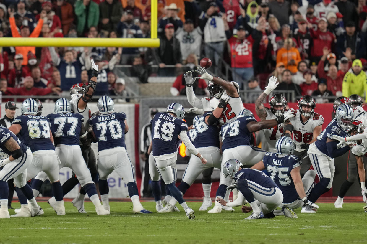 Dallas Cowboys place kicker Brett Maher (19) misses an extra point against the Tampa Bay Buccaneers. (AP Photo/John Raoux)