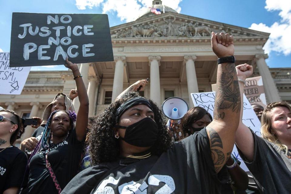 Hundreds of protesters gather during a rally demanding justice for Breonna Taylor outside the Kentucky state Capitol in Frankfort, Ky., on Thursday, June 25, 2020.