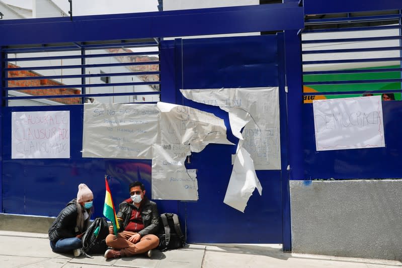 Demonstrators participate in a protest in La Paz