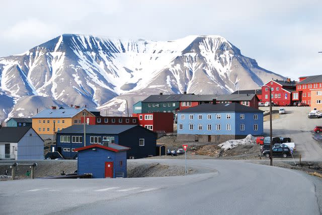 <p>annaswe/Getty Images</p> A springtime shot of the town of Longyearbyen, in Svalbard.