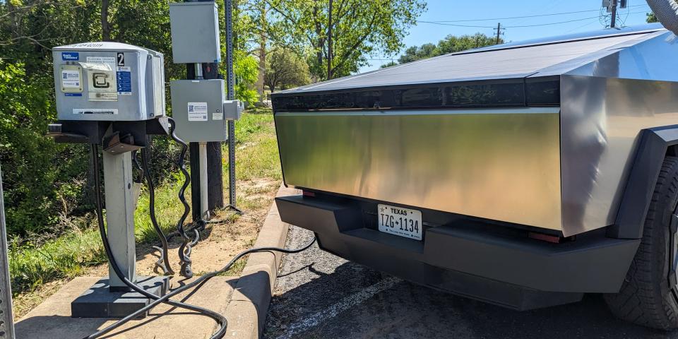 Public EV charging station with Tesla Cybertruck