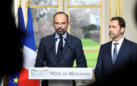 French Prime Minister Edouard Philippe (L) gives a press conference next to French Interior Minister Christophe Castaner, on March 18, 2019 at the Matignon hotel in Paris, to announce measures after weekend riots. - Credit: &nbsp;BERTRAND GUAY/AFP