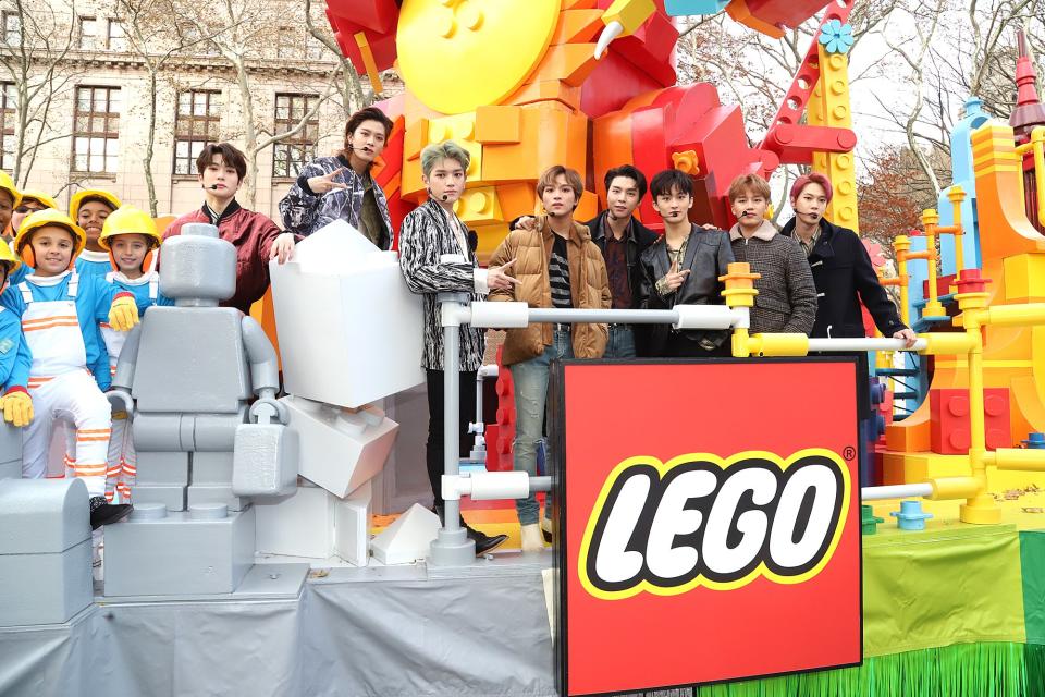 NCT 127 not only performed but also rode on the Brick-Changer from The LEGO Group float.