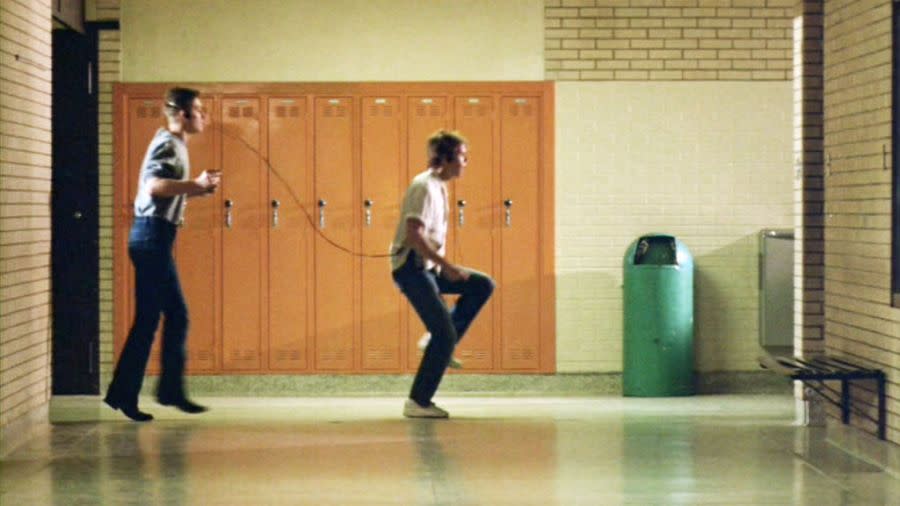 PAYSON – FEBRUARY 17: The movie “Footloose”, directed by Herbert Ross and written by Dean Pitchford. Seen here from left, Chris Penn as Willard being taught dance coordination by Ren (played by Kevin Bacon). Initial theatrical release February 17, 1984. Screen capture. Paramount Pictures. (Photo by CBS via Getty Images)