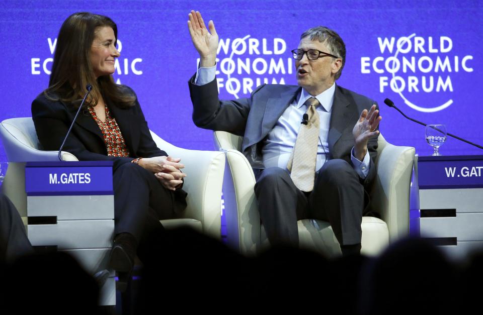 The world's richest man can afford to go to Davos. Few others can. Bill Gates, Co-Chair of the Bill & Melinda Gates Foundation gestures next to his wife Melinda French Gates during the World Economic Forum gathering in January. REUTERS/Ruben Sprich