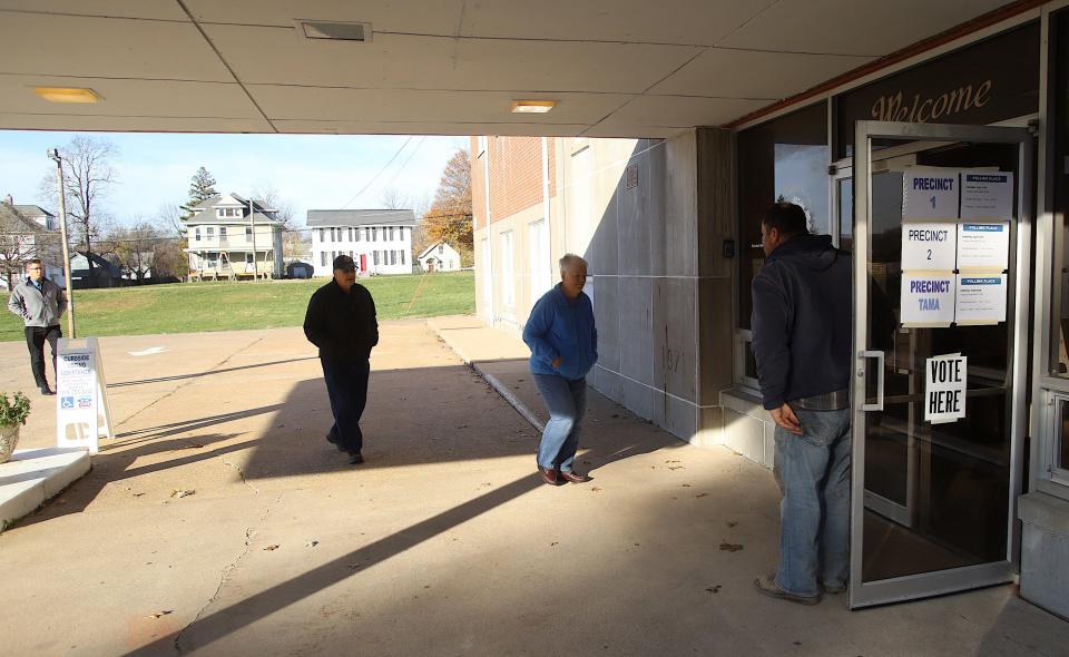 Voters head into precinct 1, 2 and Tama for the midterm elections Tuesday at Oak Street Baptist Church in Burlington.