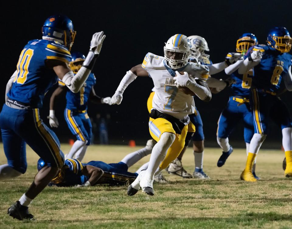 Cape Henlopen's Maurki James (7) breaks through the defensive for his first of five touchdowns in a 46-14 win over Sussex Central last Friday in the semifinals of the DIAA Class 3A football playoffs.